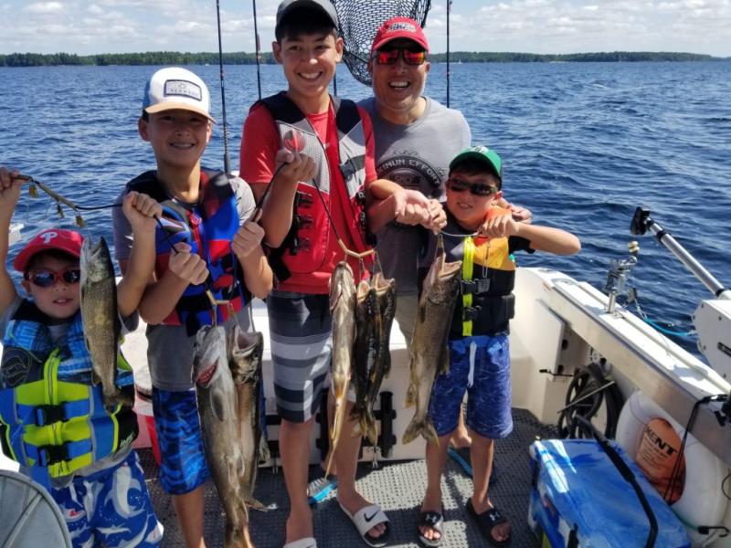 Richard Lee and family on boat