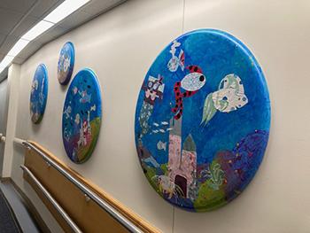 Fish and coral art piece on the wall at Boston Children's Hospital