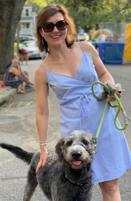 Alicia Casey with a large grey terrier