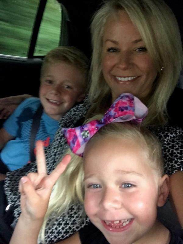 Kara May with two children