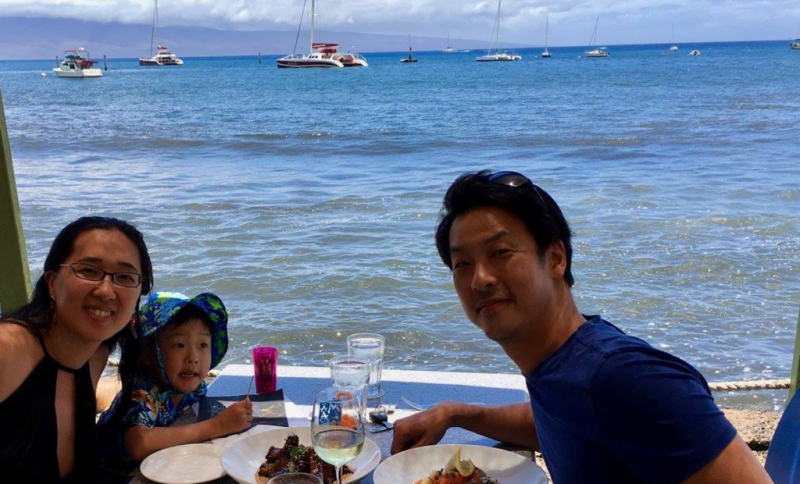 Ruobing Wang and family at an oceanside meal